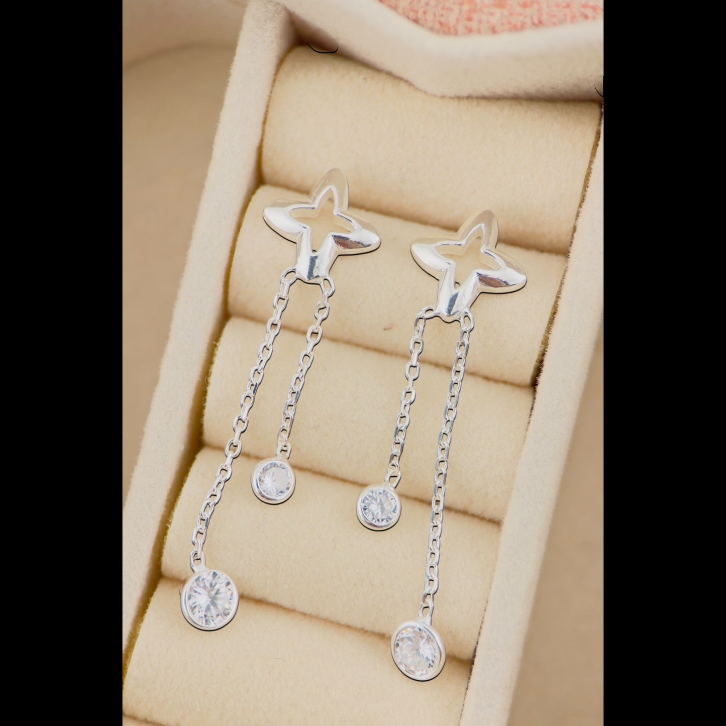 Aretes Estrella con Caída en Plata 925