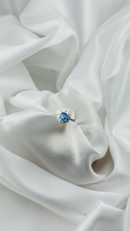 Anillo floral vintage con circonia azul celeste en plata italiana 925