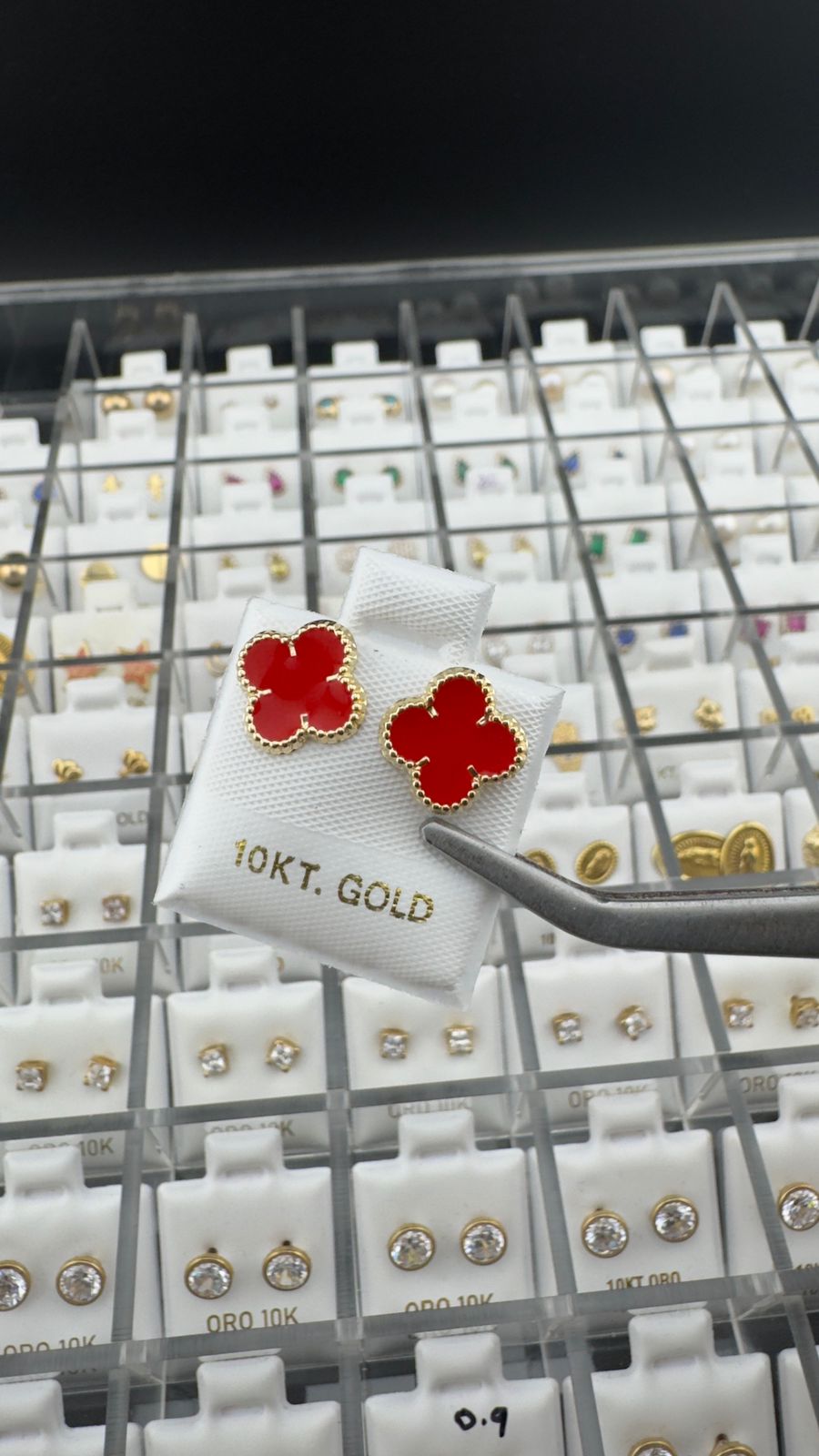 Aretes trébol rojo en Oro 10K