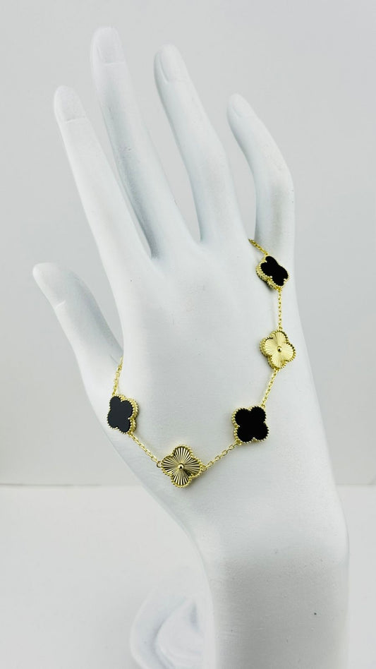 Pulsera Sofisticada Tréboles Negros y Oro